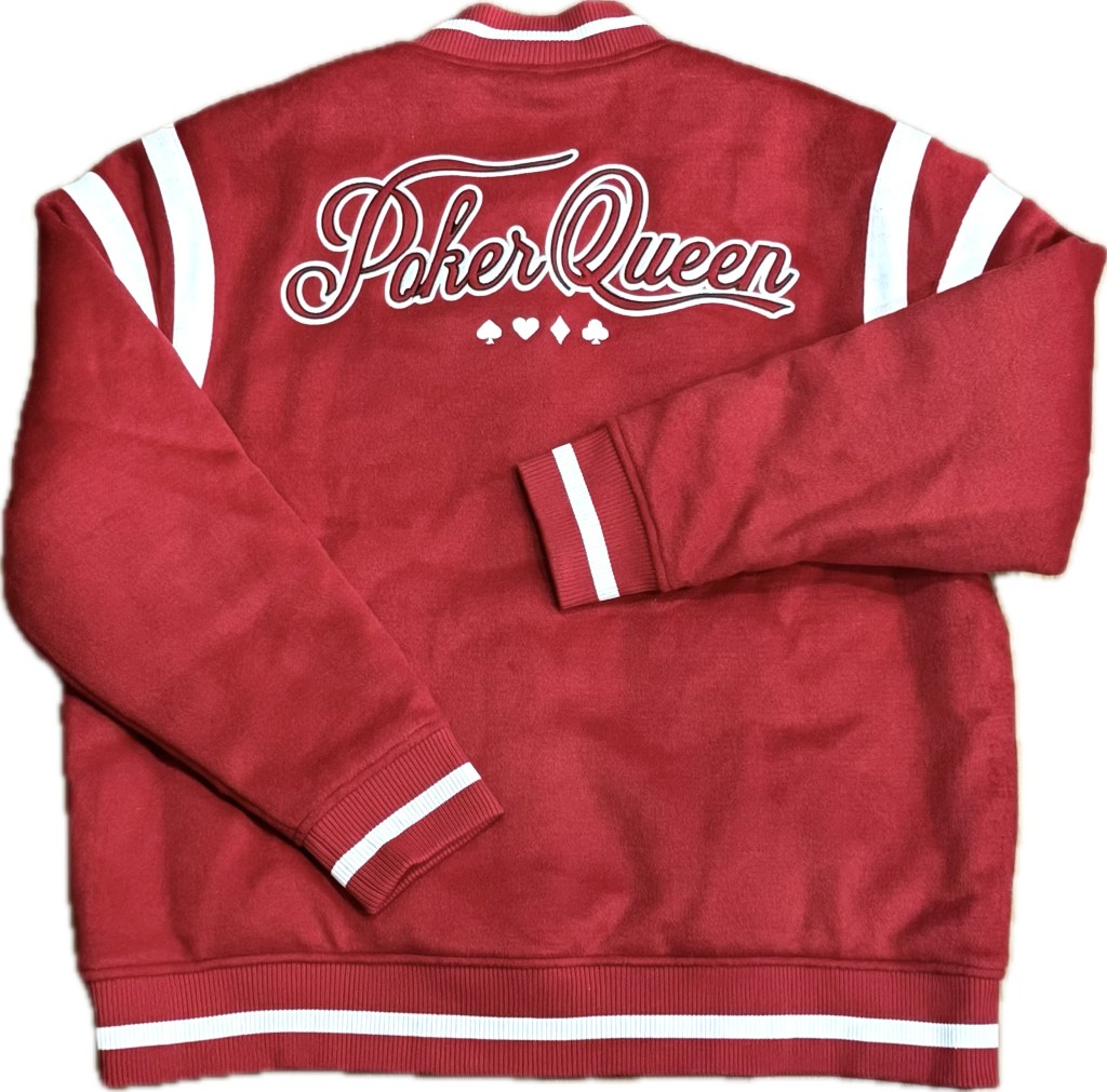 Red jacket featuring the text 'Poker Queen' on the back, with white stripes on the sleeves.